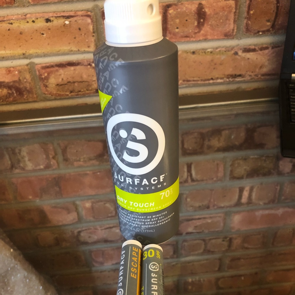 Surface dry touch sunscreen spray & lip balm